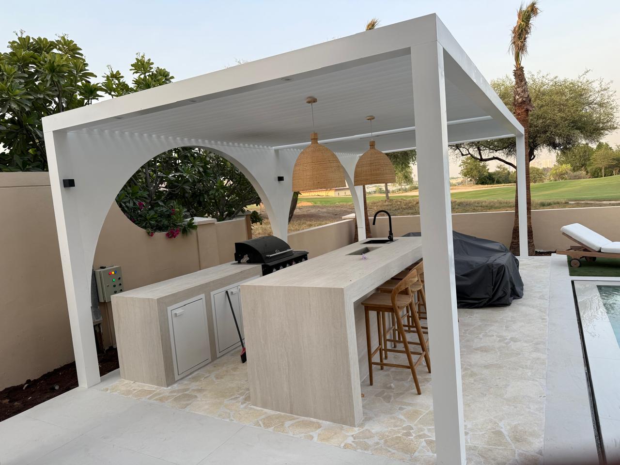 Poolside outdoor kitchen & bar — Emirates Hills golf frontage